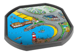 The Charlotte's Cove mat is ideal for use with a Tuff Tray. Explore the castle, the pier, the funfair and the lighthouse. Drive toys cars around to see the sites and take toy people to the beach.  Printed onto a high quality, durable vinyl material.  86cm x 86cm (approx )  Designed to fit in the Mini Tuff Tray or the Tuff Spot.