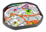 The Dragon Blaze Cave tuff tray insert mat, ideal for any children interested in fantasy and dragons, features a fire river, lava lagoon, hot coals pathway, dragons, magic crystals, dragon eggs. Ideal for creative play and to stir the imagination of mythical creatures.  Printed onto a high quality, durable vinyl material.  86cm x 86cm (approx )  Designed to fit in the Tuff Tray or the Tuff Spot.